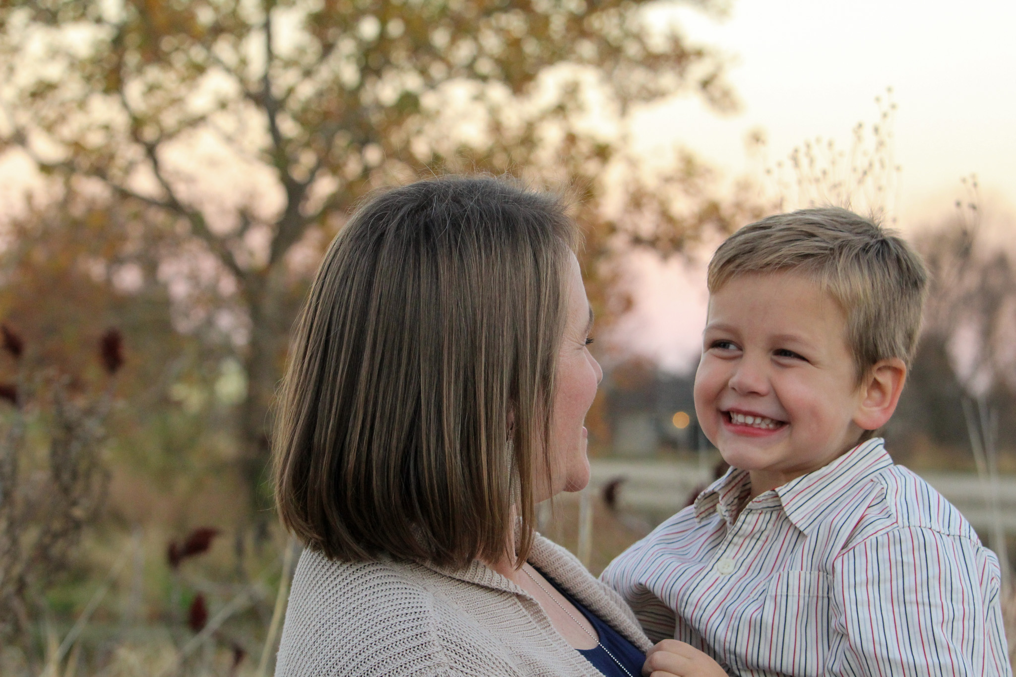 boy smiling mom outdoor fall photo